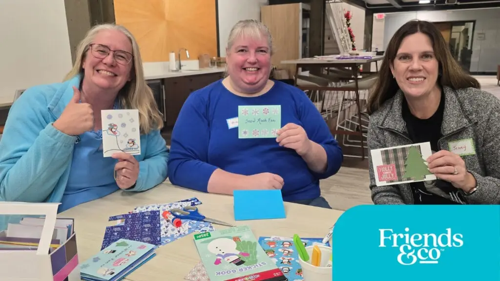 Volunteers making cards for older adults with Cards Connect at Friends & Co non-profit in the Twin Cities showing their pretty cards
