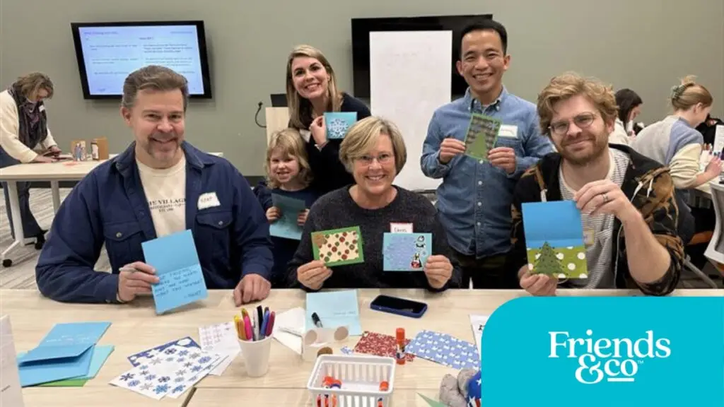 Volunteers making cards for older adults with Cards Connect at Friends & Co non-profit in the Twin Cities showing their hand-made cards