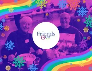 Rainbow Queer colored snowflakes swirling around a smiling older people at a Queer Twin Cities Event