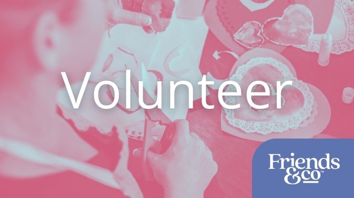 Hand making valentines card, volunteer, with Friends & Co logo