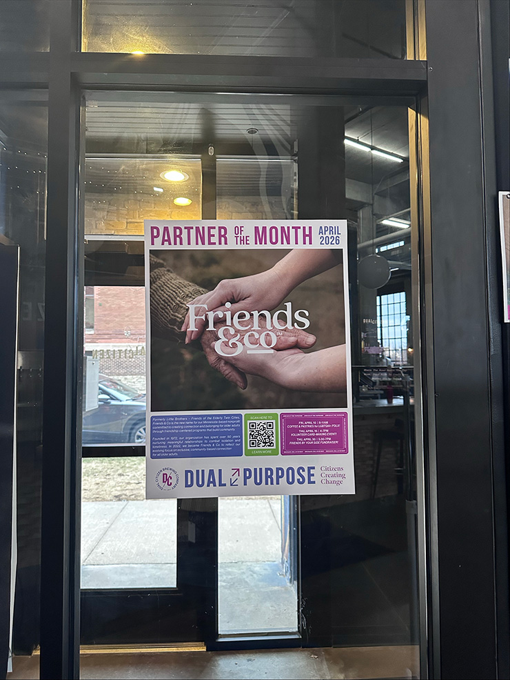 Doorway to Dual Citizen Brewing Company with Friends & Co sign