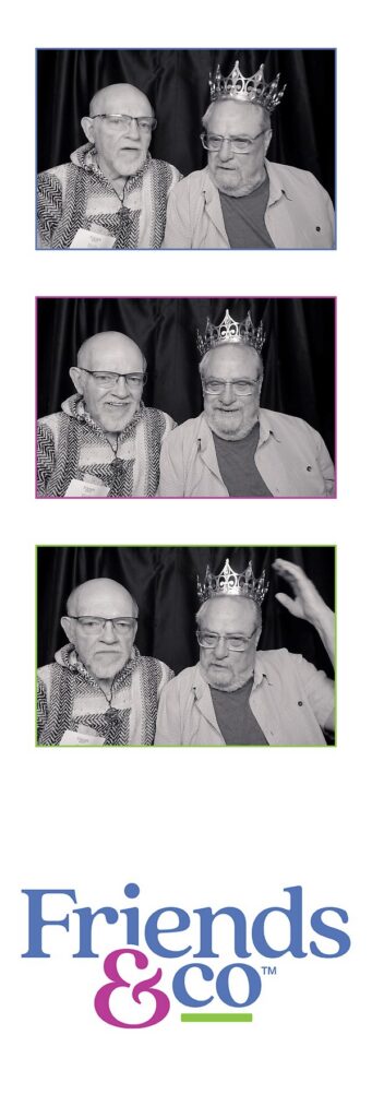 two men friends in photobooth at Friends By Your Side fundraiser by Friends & Co
